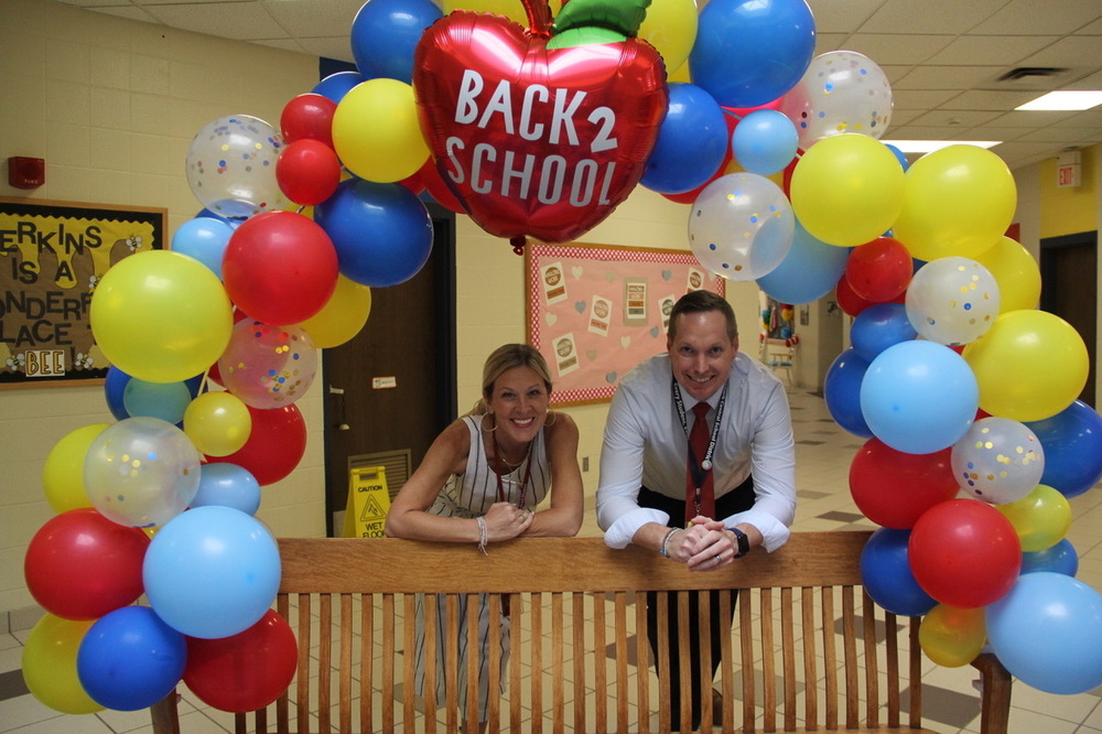 Above: Superintendent Susan Hasenauer and Perkins School Principal Pete Czerkas in the festively decorated school atrium